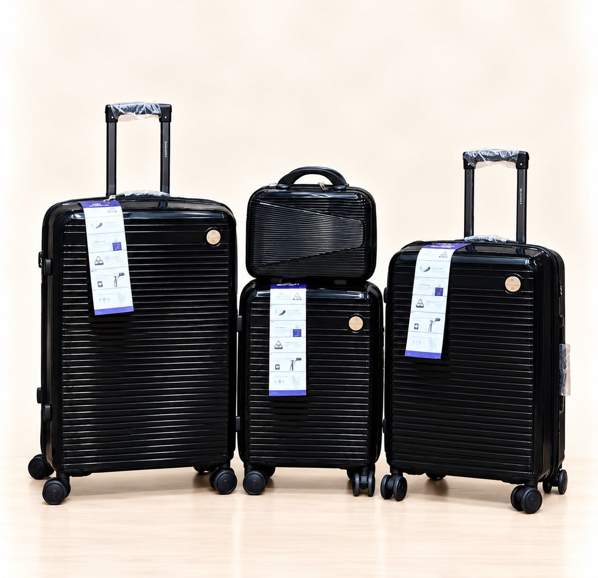 A three-piece pink luggage set consisting of a large spinner suitcase, a medium spinner suitcase, and a matching small handbag, all with telescoping handles and wheels, shown on a light beige background. 