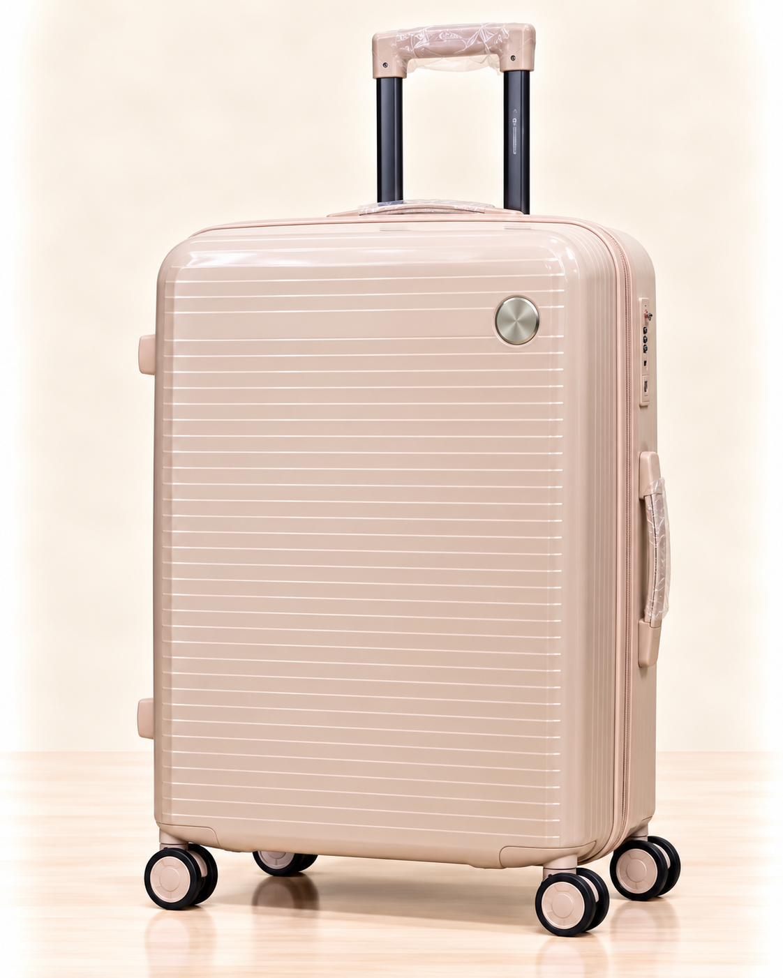 A three-piece pink luggage set consisting of a large spinner suitcase, a medium spinner suitcase, and a matching small handbag, all with telescoping handles and wheels, shown on a light beige background. 