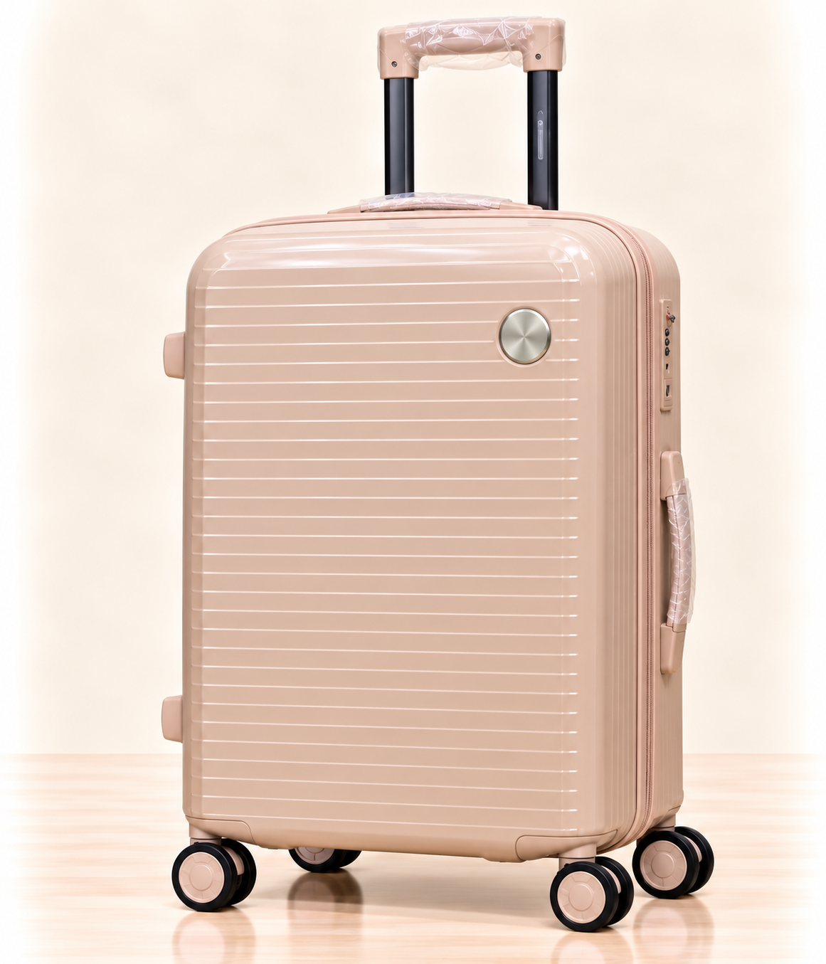 A three-piece pink luggage set consisting of a large spinner suitcase, a medium spinner suitcase, and a matching small handbag, all with telescoping handles and wheels, shown on a light beige background. 